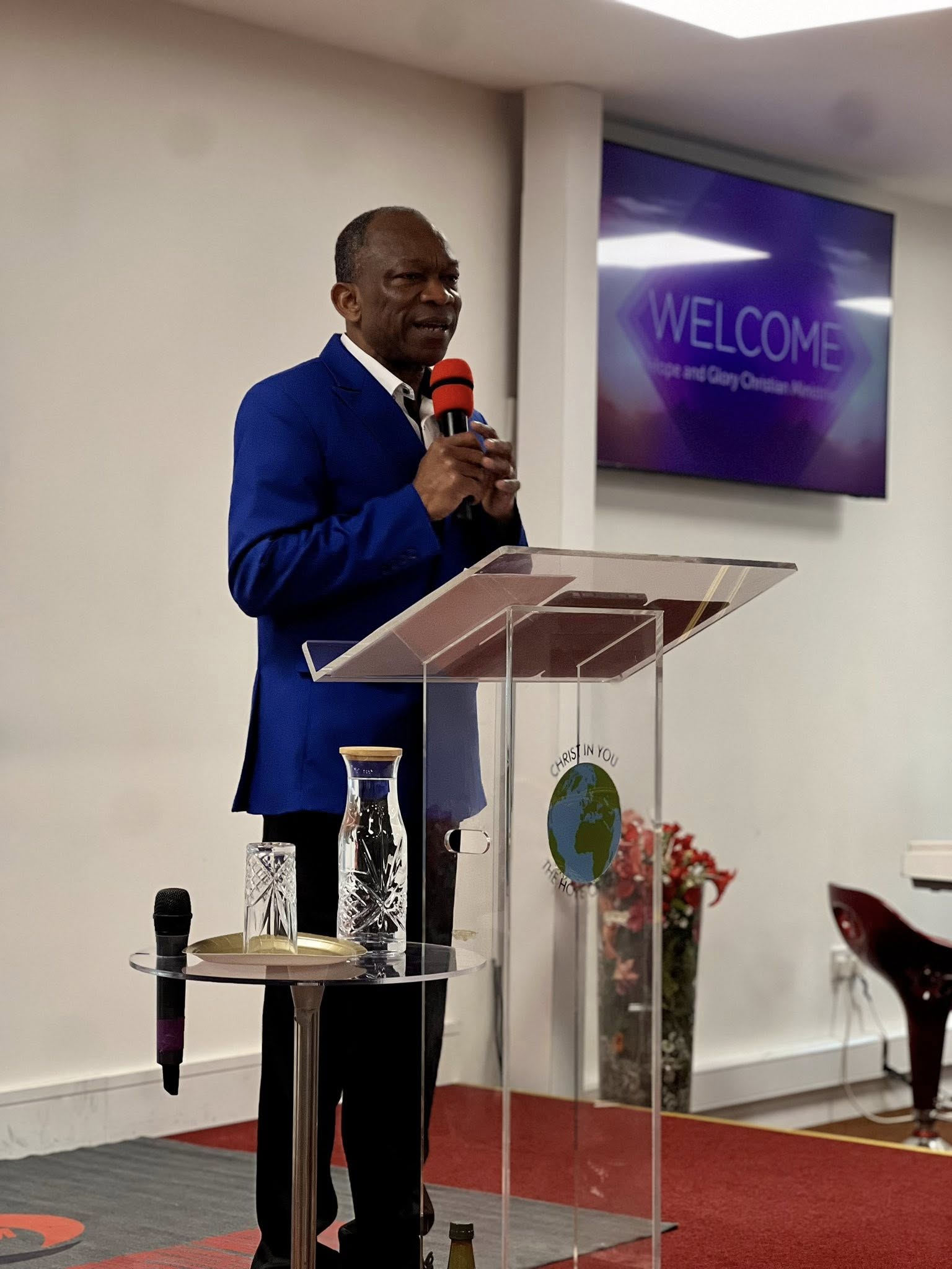 Lead Pastor Anthony Joseph speaking at the pulpit
