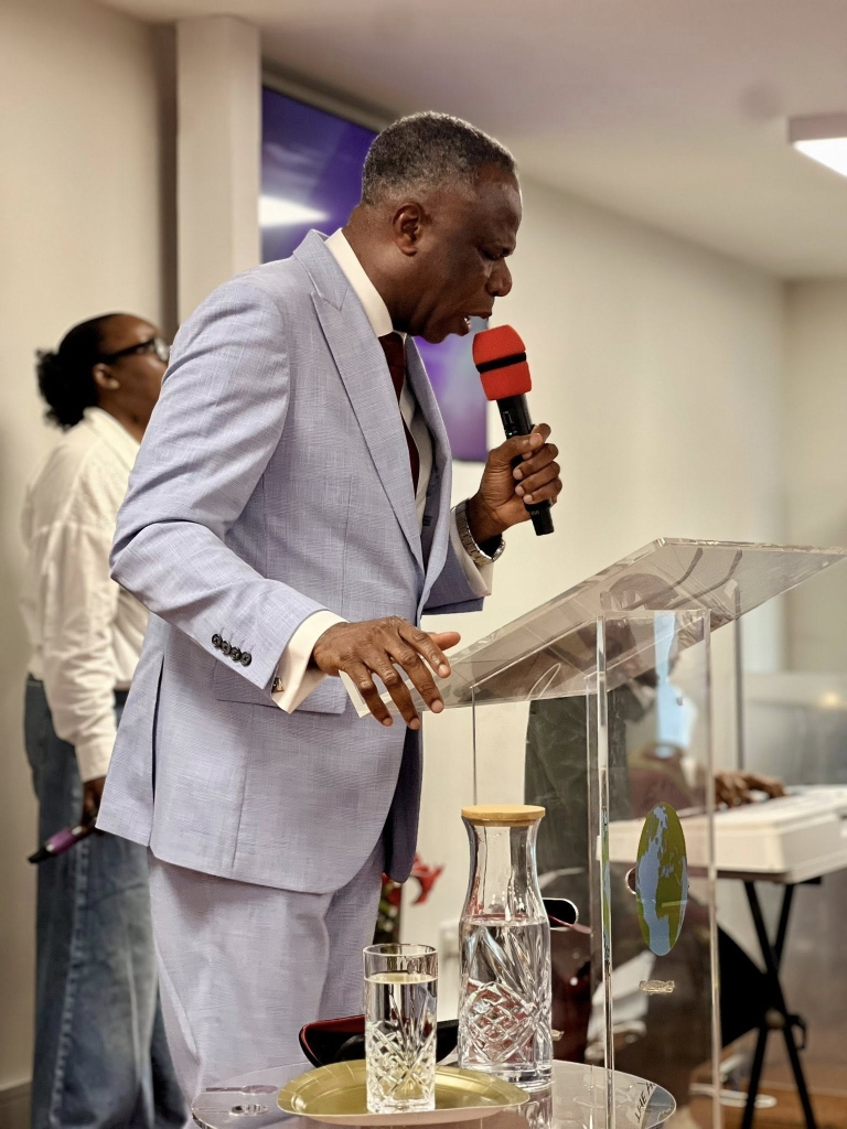 Guest minister preaching at a previous event